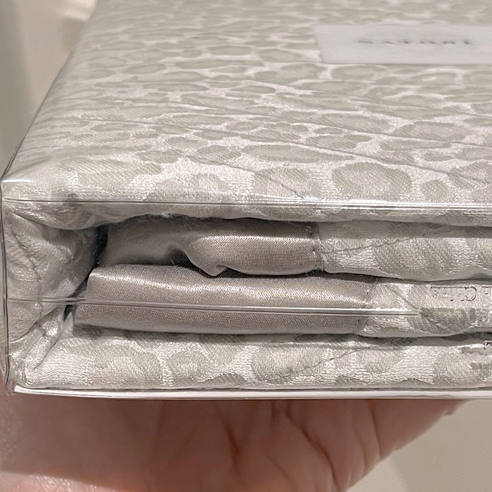 Standard size pillow, sham by Natori in snow leopard pattern